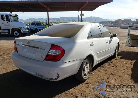 2003 Toyota Camry Le V6 z USA, uszkodzony, nr VIN 4T1BF32K73U036932